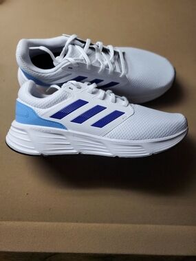 adidas White Athletic Running Shoes with Blue Accents